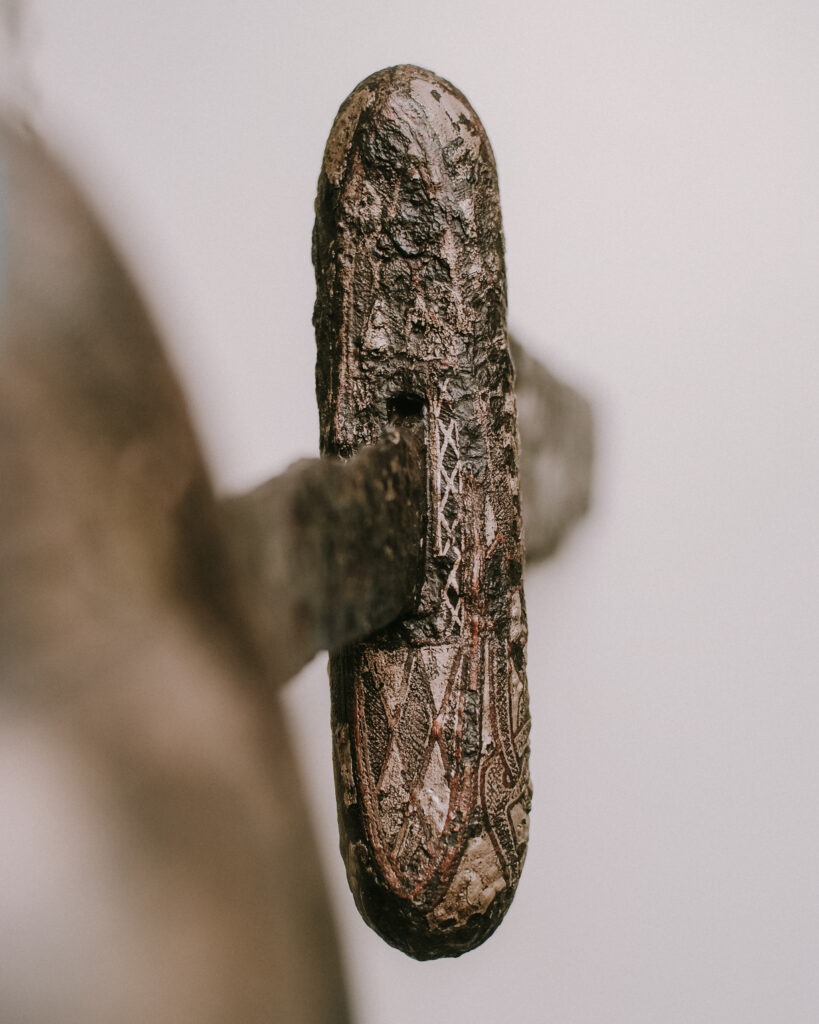 Viking Age grave find from Gjermundbu (farm no. 105, property no. 1), Haug parish, Norderhov parish district, Buskerud. Grave I. The find was reported to the University’s Oldsaksamling (Collection of Antiquities) on 30 March 1943. Curator Sverre Marstrander and assistant Charlotte Thomas were immediately sent to the site. On the basis of Marstrander’s report of 17 April 1943, the following may be stated: The find was made during the excavation of a mound. The Gjermbu or Gjermundbu farms are situated high in the hills at the upper end of Haugsbygd, with extensive views over the Ringerike plain and westward towards the mountains of Telemark.